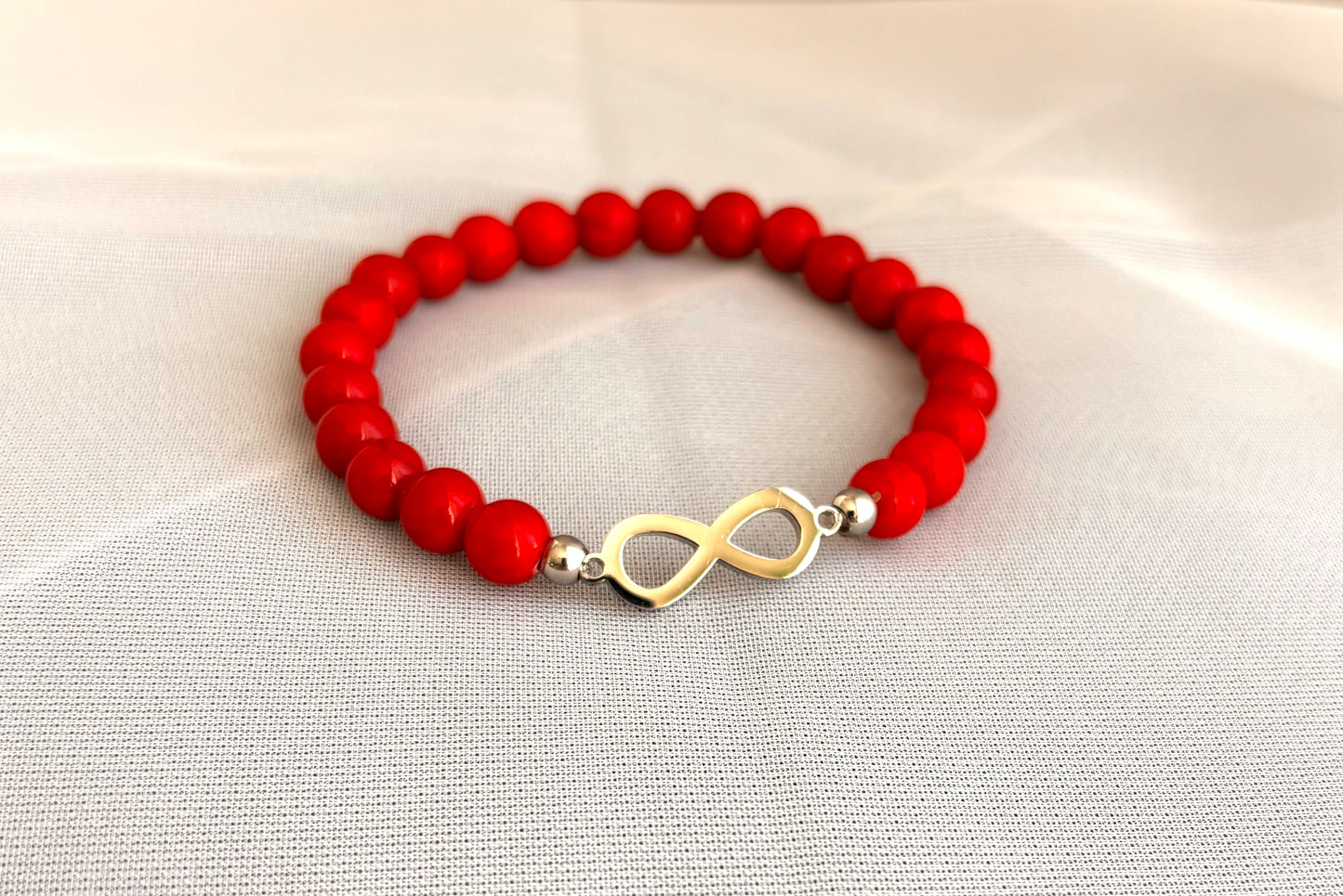 Red Jade Beaded Bracelet with Stainless Steel Infinity Charm